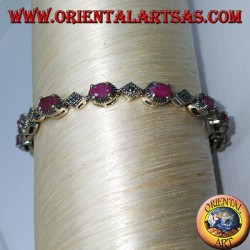 Pulseras de plata con 12 rubíes ovalados engastados con 4 mandíbulas y marcasita.