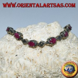 Pulseras de plata con 12 rubíes ovalados engastados con 4 mandíbulas y marcasita.
