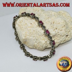 Bracelets en argent avec 12 rubis ovales serties de 4 mâchoires et de marcassite