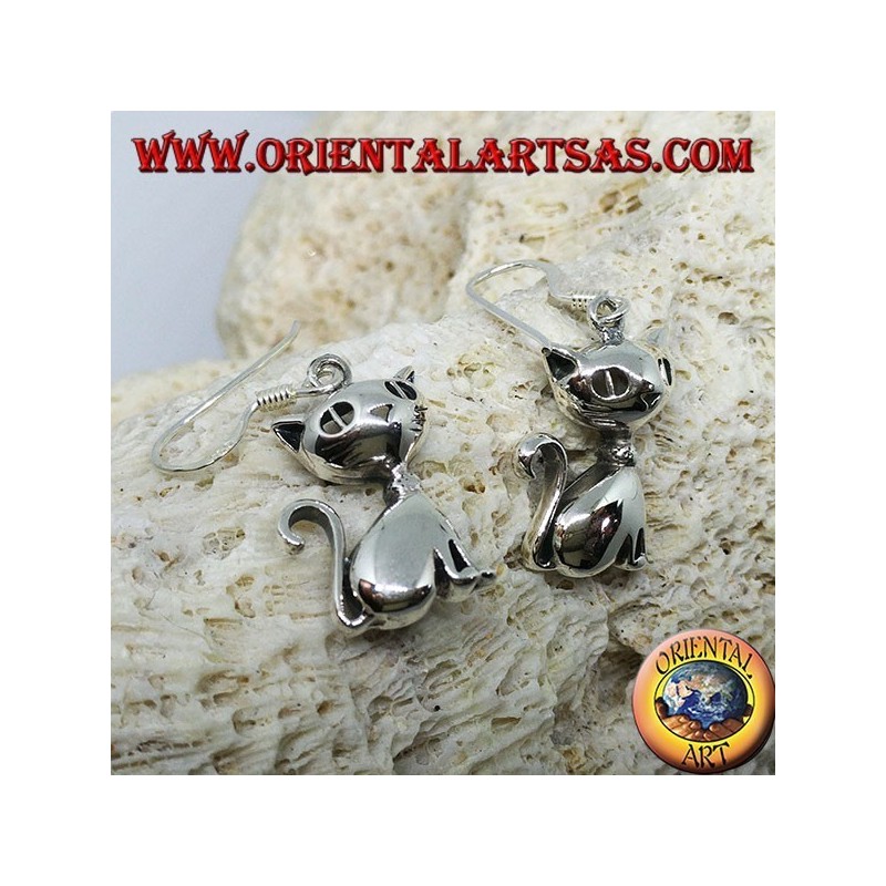 Silver earrings in the shape of a sitting cat