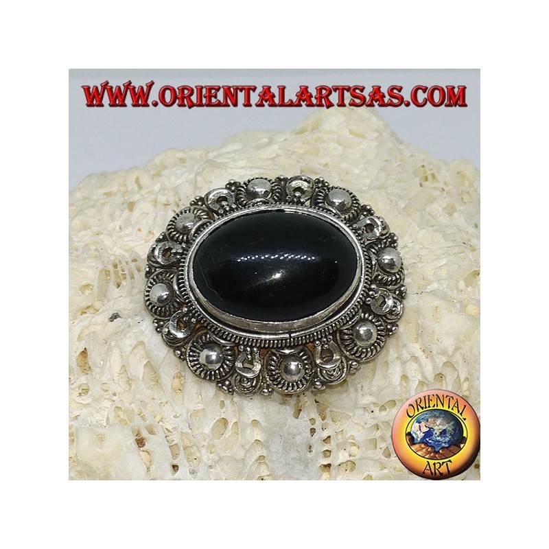 Broche de plata hecho a mano con ónix oval