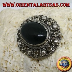 Handmade silver brooch with oval onyx