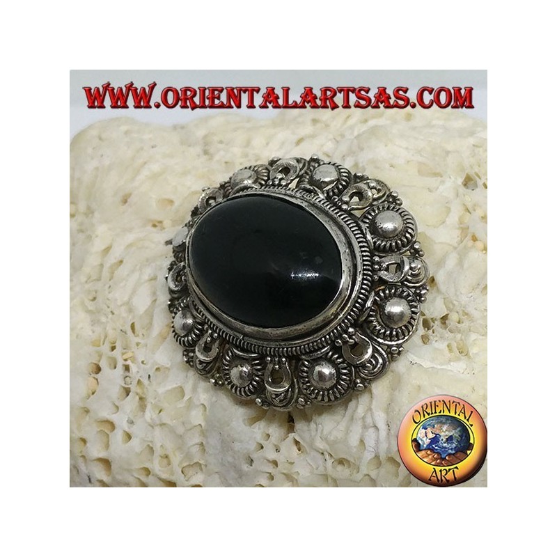 Handmade silver brooch with oval onyx
