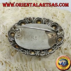 Broche de plata hecho a mano con ónix oval