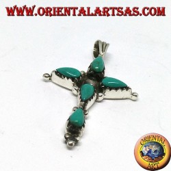 Cruz de plata con cinco turquesas en forma de gota.