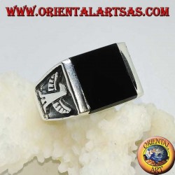Silver ring with square onyx and imperial bas-relief eagles on the sides
