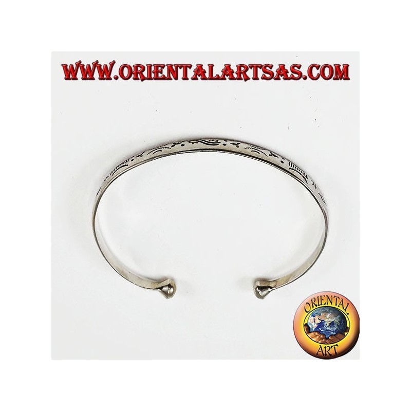 Rigid bracelet in silver, with handmade dawn and sunset engravings