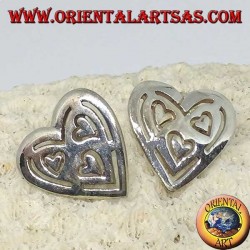 Silver lobe earrings in pierced heart of other 3 hearts