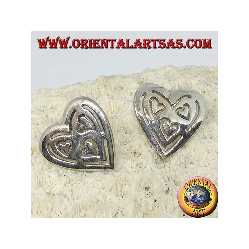 Silver lobe earrings in pierced heart of other 3 hearts