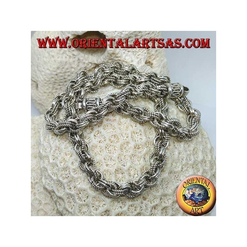 Silver necklace with alternate smooth and worked rings