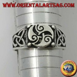 Silver ring with triskele three spirals and Tyrone knots on the sides