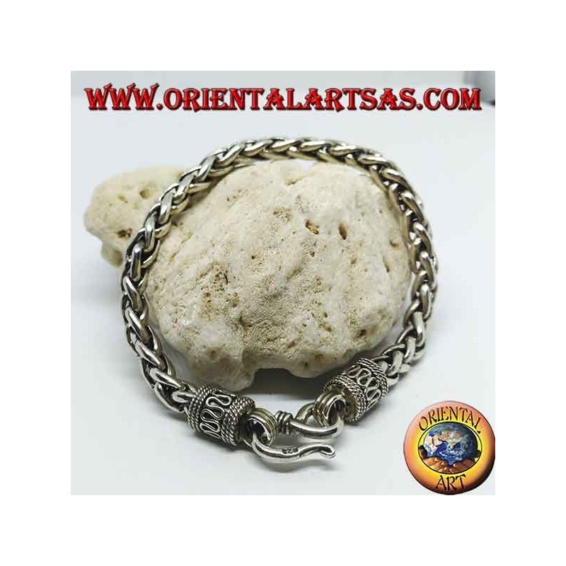 Silver bracelet with intertwined rings, square section