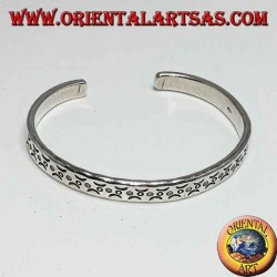 Rigid bracelet in silver, with beating incisions of contrived moons