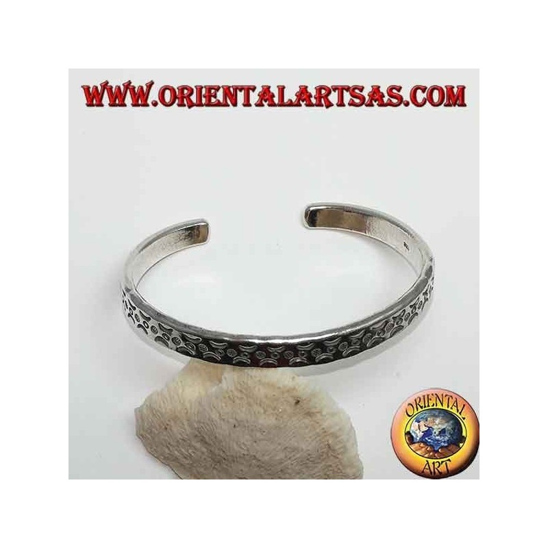 Bracciale rigido in argento, con incisioni a battitura di lune contraposte
