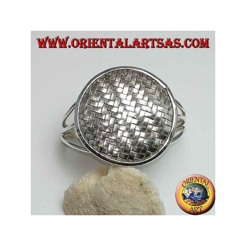 Silver bangle, round shield with intertwined bands