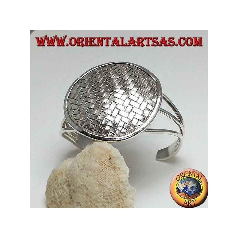 Silver bangle, round shield with intertwined bands