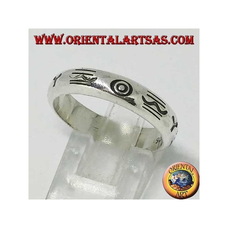 Silver band ring engraved with aboriginal symbols