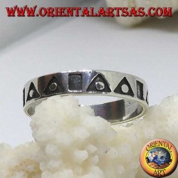 Bague en argent avec triangles et carrés creux