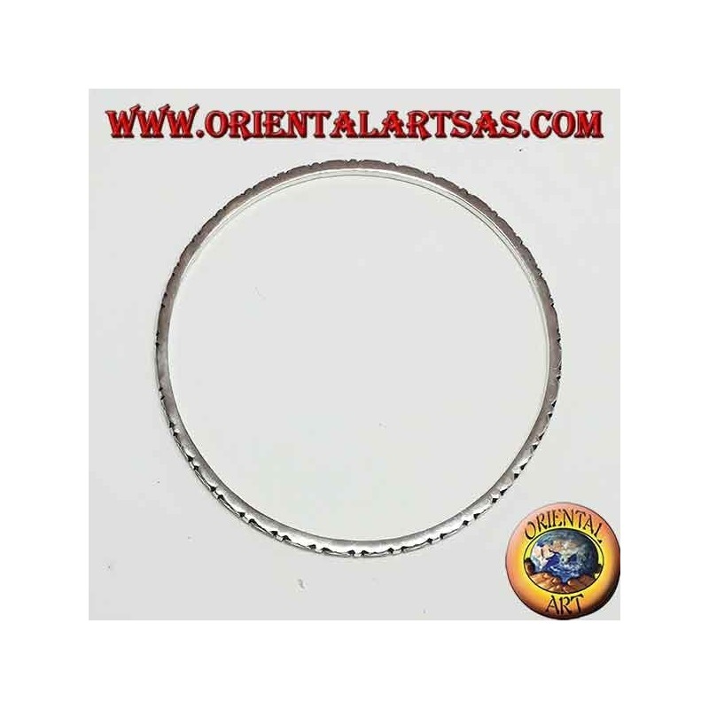 Bracciale ad anello in argento, con rombi intagliati