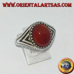 Silver ring with oval carnelian set with triangles and lateral dot decorations