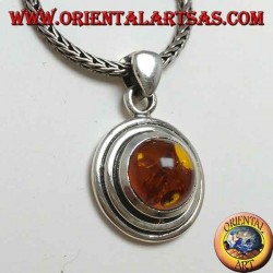 Silver pendant with a round amber, and two-wax edge