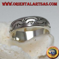 Silver ring with two rows of curved darts carved by hand