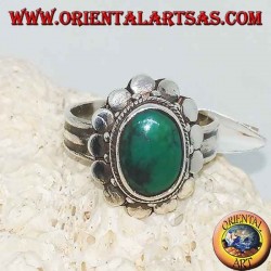 Anillo de plata con turquesa ovalada antigua natural, ribeteada con placas redondas
