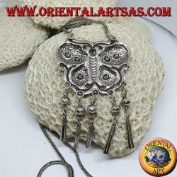 Long silver necklace with a butterfly-shaped medallion and pendants