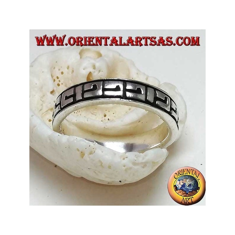 Silver band ring with Greek bas-relief decorations