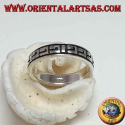 Silver band ring with Greek bas-relief decorations