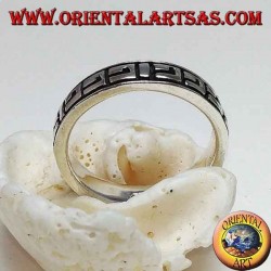 Silver band ring with Greek bas-relief decorations