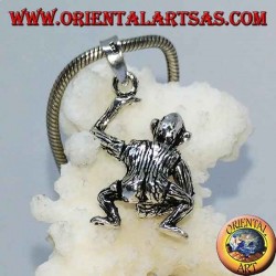 Colgante de plata, mono que se masturba moviendo la cabeza con los brazos