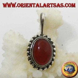 Silver pendant with oval carnelian and border with dots