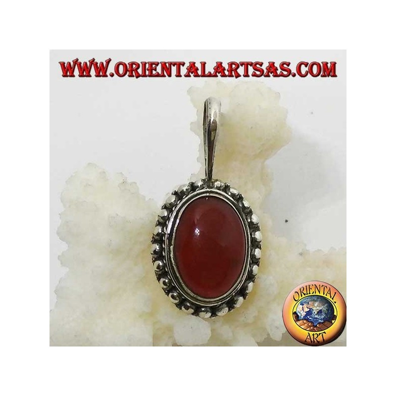 Silver pendant with oval carnelian and border with dots