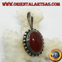 Silver pendant with oval carnelian and border with dots