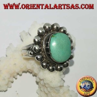 Anello in argento con turchese antico tibetano ovale contornato di semisfere