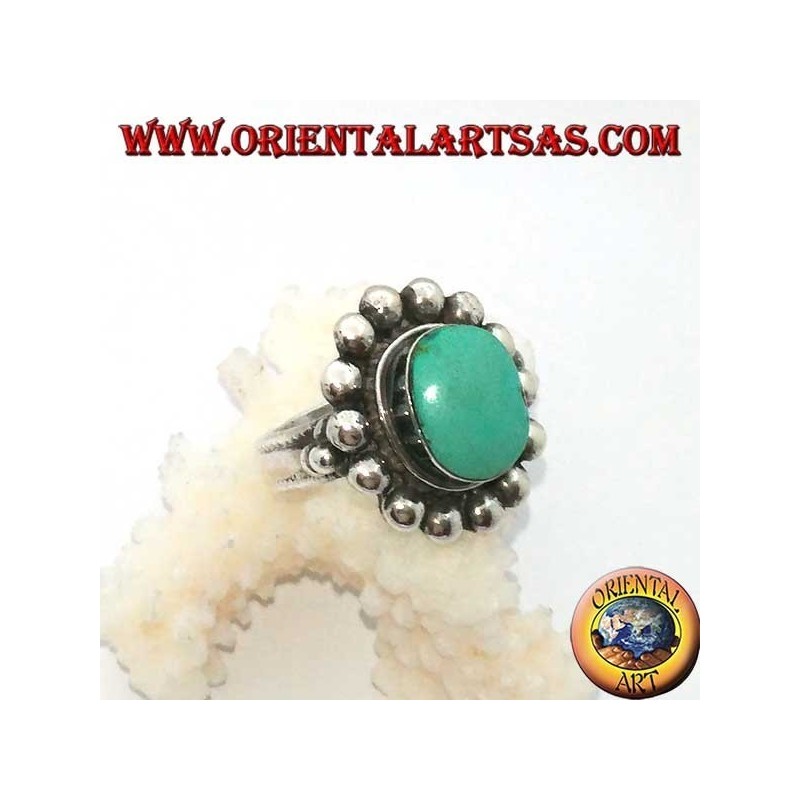 Anello in argento con turchese antico tibetano ovale contornato di semisfere