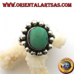 Silver ring with antique Tibetan turquoise oval edged with hemispheres