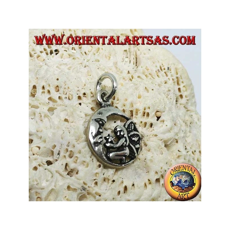 Silver fairy on her knees pendant that gives the star to the moon