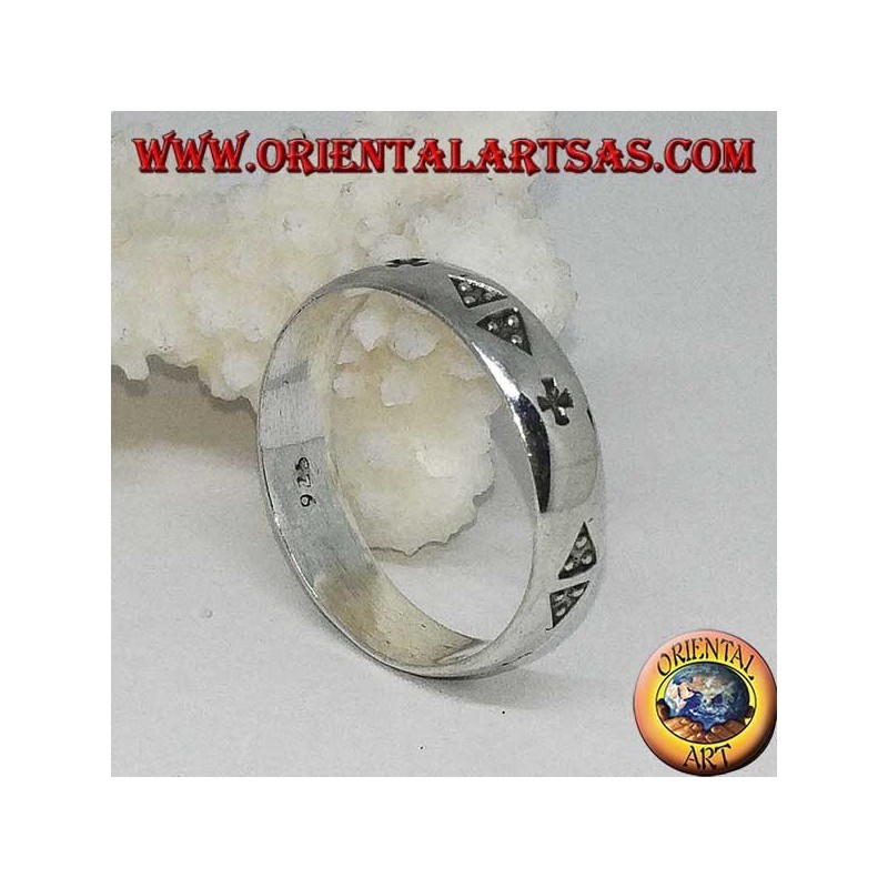 Silver ring, band with bas-relief inlays of triangles with three dots and cross