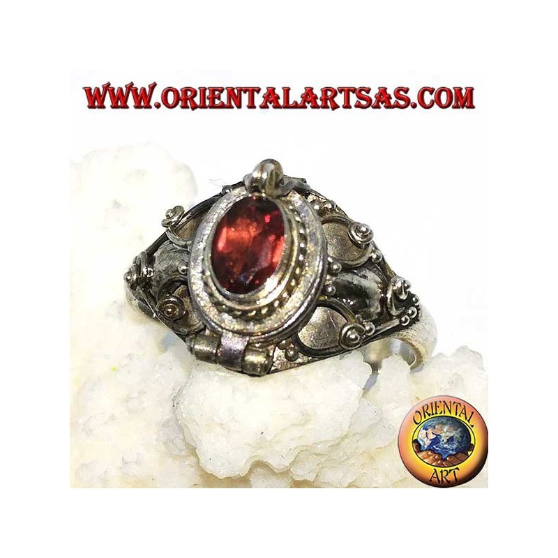 Silver box ring (poison holder) with oval garnet and baroque decorations