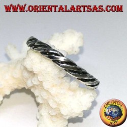 Silver ring with two wires rolled up on itself