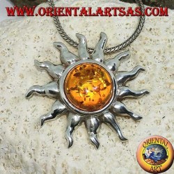 Pendant in silver sun with rays and hemispherical Amber in the center