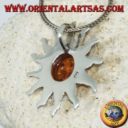 Pendant in silver sun with rays and hemispherical Amber in the center
