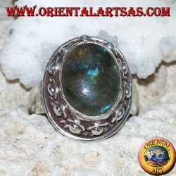 Silver ring with oval labradorite with blue reflections and studded setting