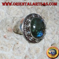 Silver ring with oval labradorite with blue reflections and studded setting