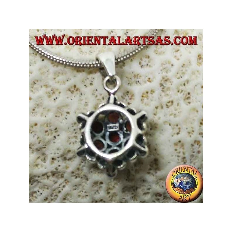 Pendentif hexagonal en argent composé de 7 grenats ronds entourés de sphères en argent