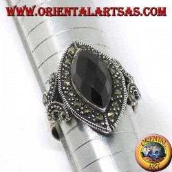 Silver ring with faceted shuttle onyx surrounded by marcasite