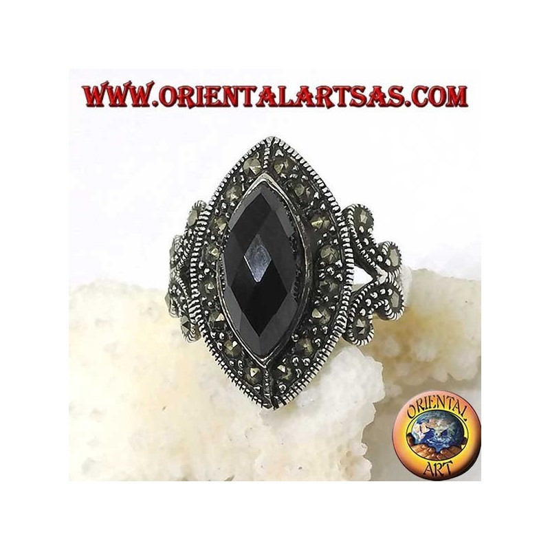 Silver ring with faceted shuttle onyx surrounded by marcasite