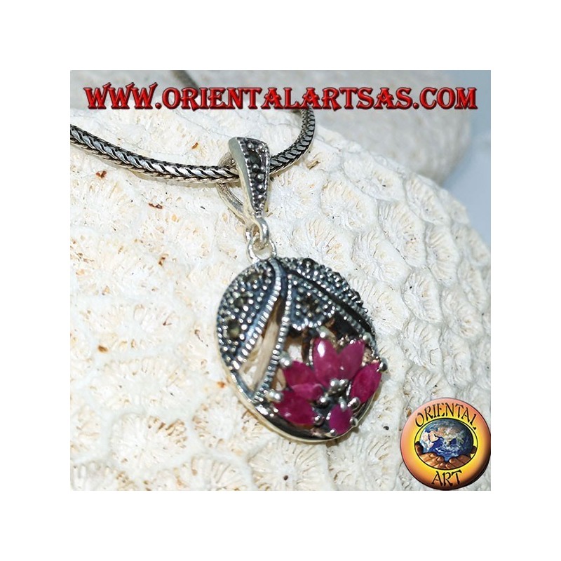 Pendentif en argent avec fleur de lotus avec 5 rubis en navette et 1 tour